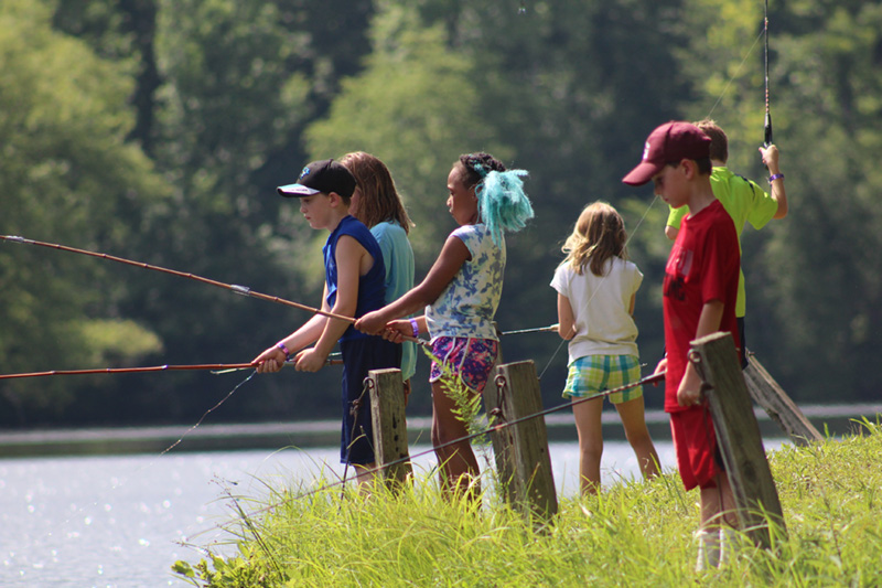 Group of youth fishing at Lake Hazel.