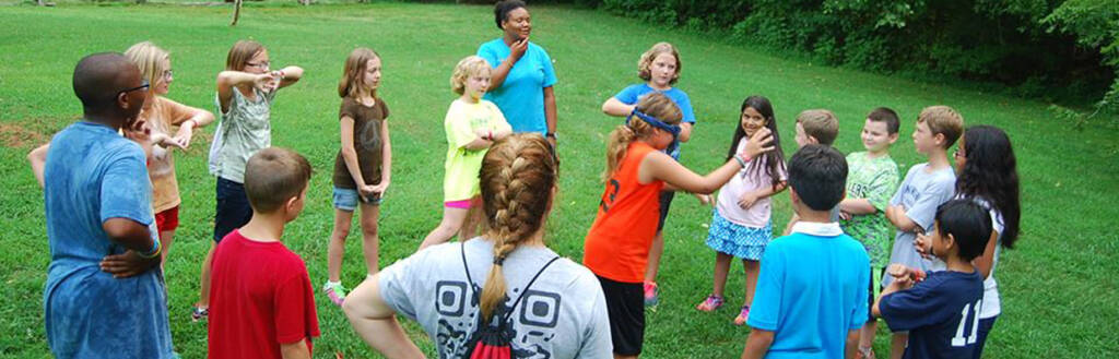 group playing a game on the grass