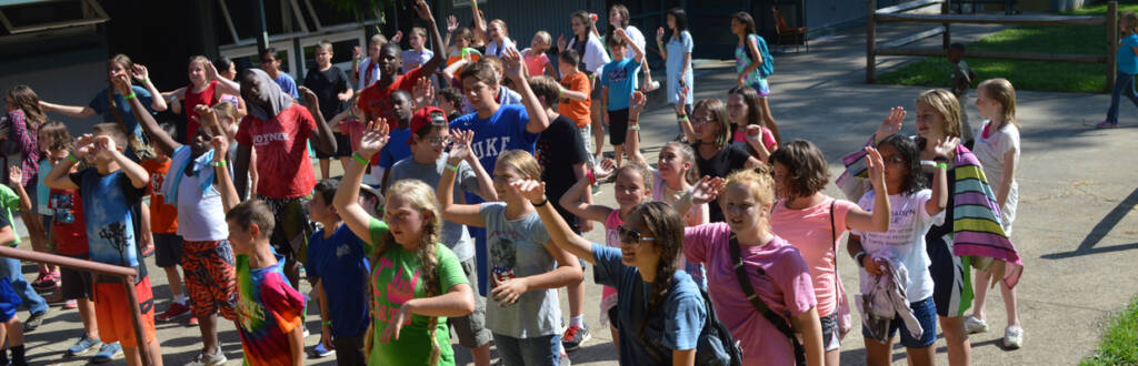 day camp group singing camp songs before lunch