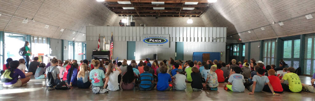 large group sitting in the recreation hall