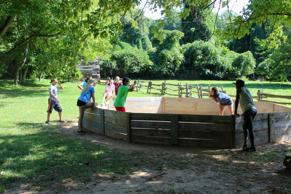 Playing ball in the gaga pit.