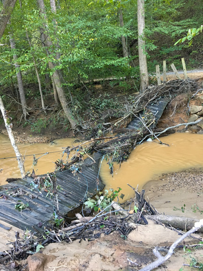 Wooden bridge destroyed by hurricane flooding