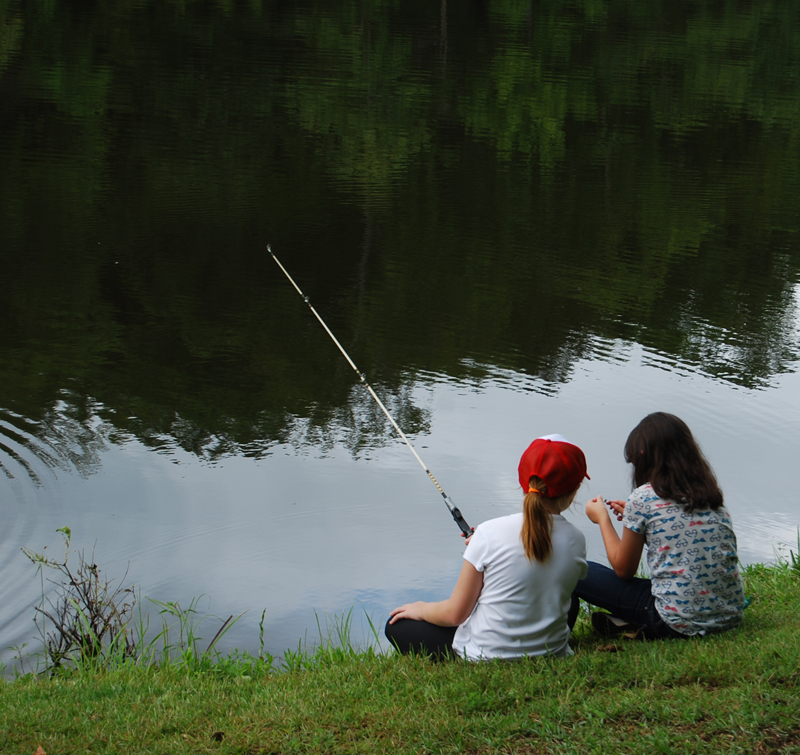 girls fishing at the lake