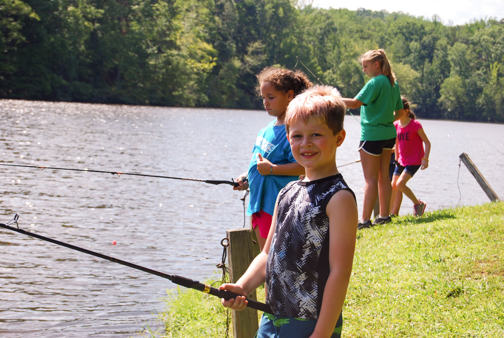 children fishing at the lake
